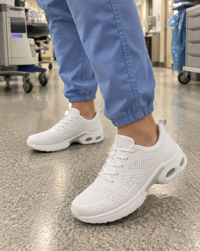 The white shoes worn with blue scrubs